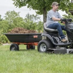 Agri-Fab 45-0552 317kg / 700lb Poly Tipping/Swivel Trailer -Garden Tool Store agri fab 45 0552 trailer lifestyle