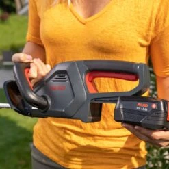 AL-KO HT 1845 18V Bosch Home & Garden Compatible Cordless Hedge Trimmer (Tool Only) -Garden Tool Store al ko ht1845 hedge trimmer lifestyle battery