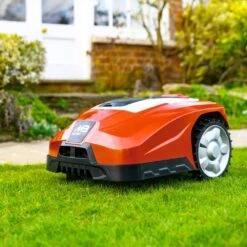 Cobra Mowbot 800 Robotic Lawn Mower - Metallic Red -Garden Tool Store cobra mowbot red lifestyle 1