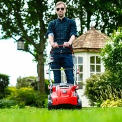 Cobra MX3440V 34cm 40V Lithium-Ion Cordless Lawn Mower (with 2.5Ah Battery & Charger) -Garden Tool Store cobra mx3440v lawnmower lifestyle 1