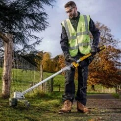 DeWalt DCMST561P1-GB 18V XR Cordless Grass Trimmer (with 5Ah Battery & Charger) -Garden Tool Store dewalt dcmst561 grass trimmer lifestyle 5