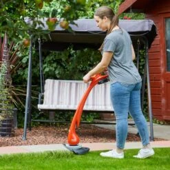 Flymo EasiTrim 250 18V Cordless Grass Trimmer & Lawn Edger (with 2.0Ah Battery & Charger) -Garden Tool Store flymo easitrim 250 grass trimmer lifestyle