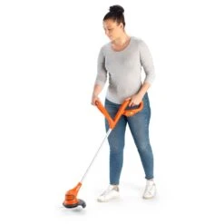 Flymo SimpliTrim Li 14.4V Cordless Grass Trimmer (with 2.0Ah Battery & Charger) -Garden Tool Store flymo fst14.4li grass trimmer in use