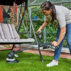 Flymo UltraTrim 260 18V Cordless Grass Trimmer & Lawn Edger (with 2.5Ah Battery & Charger) (Bundle Builder) 20 Flymo UltraTrim 260 18V Cordless Grass Trimmer & Lawn Edger (with 2.5Ah Battery & Charger) (Bundle Builder) -Garden Tool Store flymo ultratrim 260 strimmer lifestyle shrubbing 2