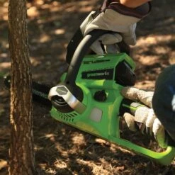 GreenWorks G24CSK2 24V Cordless Chainsaw (with 2Ah Battery And Charger) -Garden Tool Store greenworks g24csk2 chainsaw lifestyle