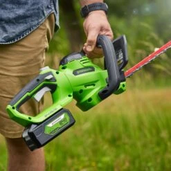 GreenWorks G24HT56IIK2 24V Cordless Hedge Trimmer (with 2Ah Battery & Charger) -Garden Tool Store greenworks g24ht56ii lifestyle 4 1