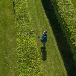 GreenWorks Pro GD60PHT51 60V Cordless Long Reach Hedge Trimmer (Bare Tool) -Garden Tool Store greenworks gd60pht51 pole hedge trimmer aerial