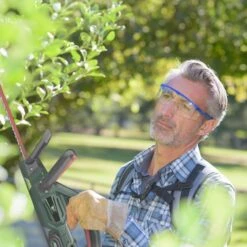 Webb Eco WEV20HTB2 20V Cordless Hedge Trimmer (with 2Ah Battery & Charger) -Garden Tool Store webb eco wev20htb2 hedge trimmer lifestyle