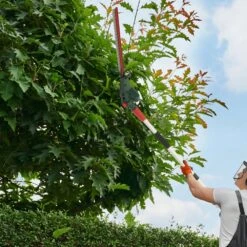 Webb Eco WEV20PHT20B2 20V Cordless Long Reach Hedge Trimmer (with 2Ah Battery & Charger) -Garden Tool Store webb eco wev20phtb2 hedge trimmer lifestyle