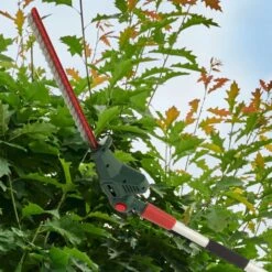 Webb Eco WEV20PHT20B2 20V Cordless Long Reach Hedge Trimmer (with 2Ah Battery & Charger) -Garden Tool Store webb eco wev20phtb2 hedge trimmer lifestyle head