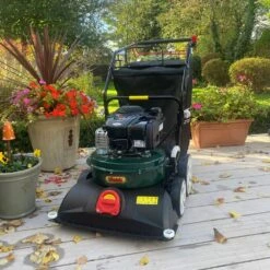 Webb WEWBVAC Self-Propelled Walk-Behind Wheeled Garden Vacuum -Garden Tool Store webb wheeled vacuum lifestyle the green reaper
